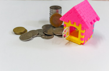 home loan or investment concept photography with selective focus on the subjects on a white...
