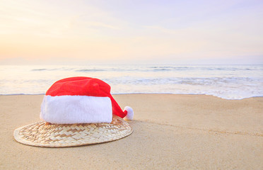 Christmas Santa hat on the beach. are texture Nature background creative tropical layout made at phuket Thailand