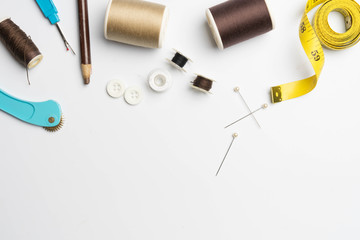 Fototapeta premium sewing supplies and accessories for needlework fabric spools
