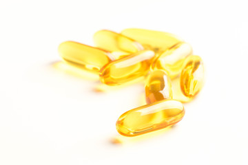fish oil capsules isolated on white