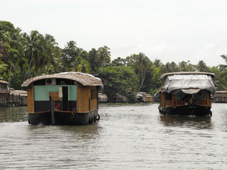 Two houseboats on backwaters in Kerala Kochi