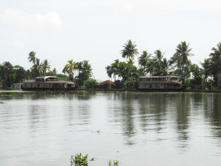 Fototapeta na wymiar Houseboat on backwaters in Kerala Kochi
