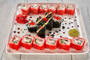 Set of different philadelphia uramaki rolls.