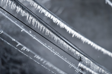 Electricity cables covered in ice after frozen rain phenomenon