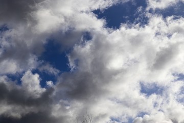 Beautiful white fluffy clouds on a deep blue sky