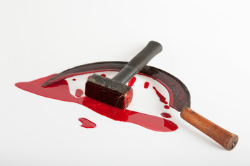 Hammer and sickle smeared with blood © fotogeng