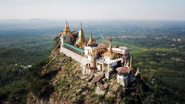 Aerial: Close Look Over the Top of Popa Taungkalat Temple