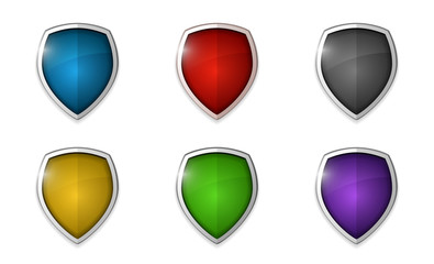 Realistic shining shield icon pack isolated on white background: blue, red, grey, yellow, green, violet. Defense, safety, privacy, security, safeguard or antivirus concept. Vector illustration
