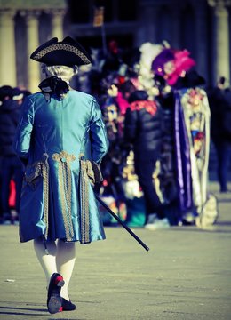 Man With Wig And Elegant Blue Venetian Noble Dress In Saint Mark