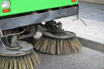 Street sweeper machine working. Street cleaning machine.
