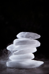 Dry ice on black background 