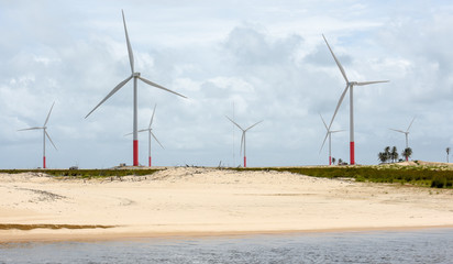 Windmills on the sand dunes of Lencois Maranhenses near Atins, Brazil