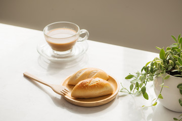 Morning breakfast with bread and coffee.