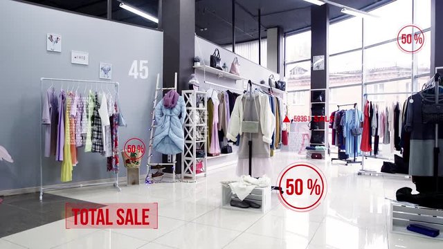 Interior of women's clothing store. Sale and discounts of 50%. Hud and call out