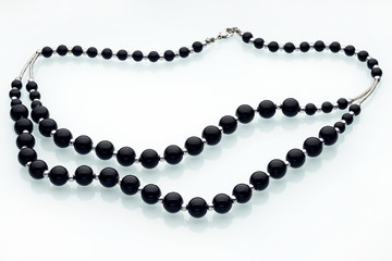 Necklaces, beads, handmade bracelets are made of artificial stone of different breeds.