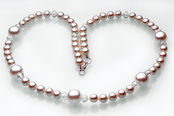 Necklaces, beads, handmade bracelets are made of artificial stone of different breeds.