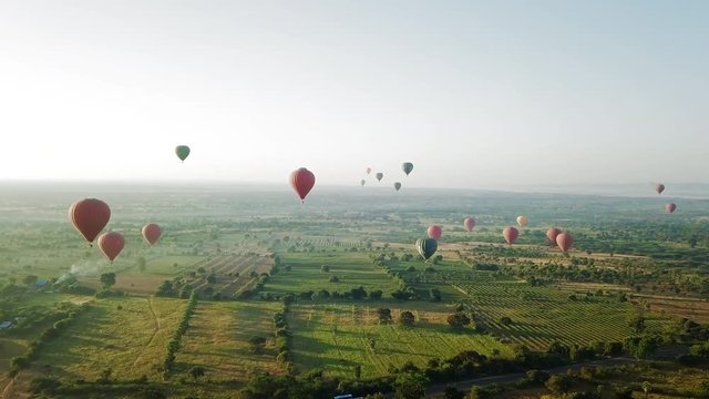 Aerial: Colorful Hot Air Balloons Soaring Over old Bagan