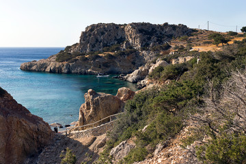 Fototapeta na wymiar Karpathos island, rocky coast with small beaches of Amopi bay - Aegean sea, Dodecanese Islands, Greece