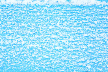 colorful background with flakes of snow and snowflakes