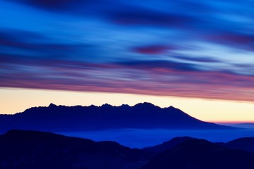 Scenic Landscape view with Soft light in morning beautiful sunrise, cloudy and foggy sea of wave fog look like around the mountain at High Tatras, Slovakia. beautiful landscape of the mountain 