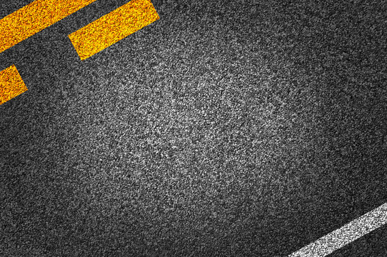 Road Texture background with Yellow and white strip. Asphalt as abstract background or backdrop.