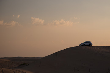 Fototapeta na wymiar Desert safari with 4x4 vehicle.