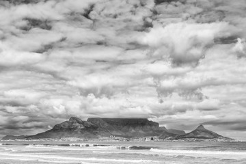 Table Mountain as seen across Table Bay from Bloubergstrand. Monochrome