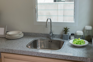 sink with faucet in kitchen room