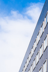 Fototapeta premium Beautiful architecture office business building with glass window shape