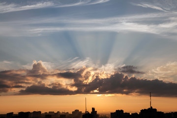 Dark rays of sunset