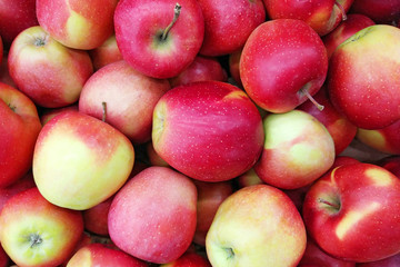 Juicy red apple background. Close up top view photography