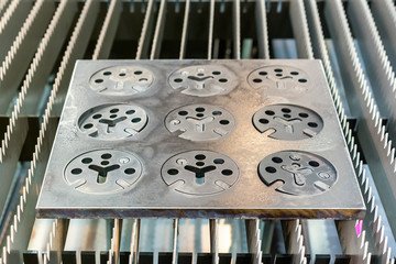 Metal sheet or plate part made from automatic and high precision laser cutting process in...