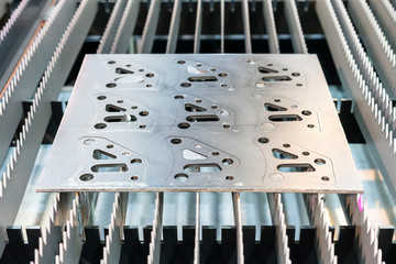 Metal sheet or plate part made from automatic and high precision laser cutting process in...