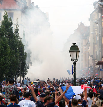 crowd celebrating in the street in France