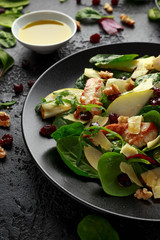 Pear, chicken salad with cheddar cheese, cranberry and walnuts. healthy food