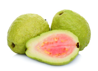 two whole and half pink guava isolated on white background