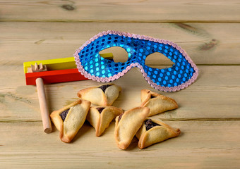 Ozney Haman cookies with noisemaker for  Purim celebration ( Jewish carnival holiday).