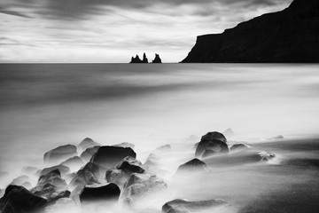 Unbelievable seascape of Reynisdrangar cliffs in the Atlantic ocean. Fantastic summer day on south Iceland, Vik village location, Europe. Beauty of nature concept background. Iceland 
