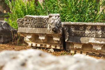 Historical site of Perge or Perga in Antalya, Turkey. Lion head sculpture. Vast remains of...