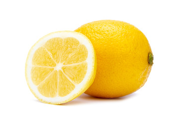 Isolated whole and slice juicy lemon on white background