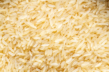 Texture of dry long golden yellow rice