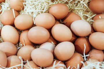Basket of organic eggs in a rural farmers market. Filtered shot with a selective focus