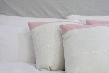 Fototapeta na wymiar Decorative pillow natural Fabric on the bed