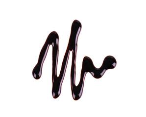 Chocolate syrup drop isolated on white background. Top view.