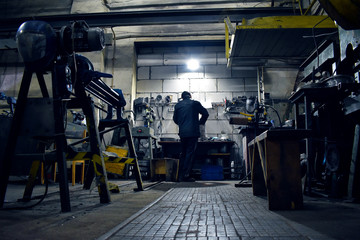  workshop with a man in the background