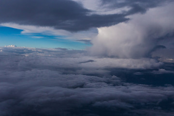 White clouds and blue sky from an airplane