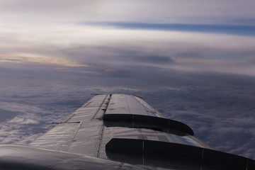 Fototapeta na wymiar Aircraft wing in flight