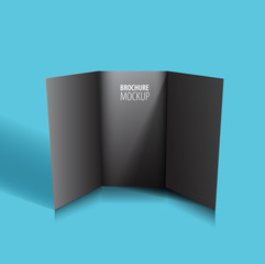 Black Brochure design isolated on blue. Realistic style.