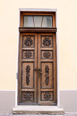 Wooden door of the building in Tallinn, Estonia