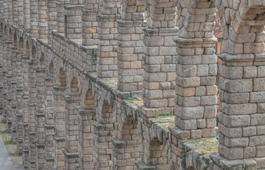 Fototapeta na wymiar The awe-inspiring and perfectly preserved Roman aqueduct of Segovia, Castile-Leon, Spain